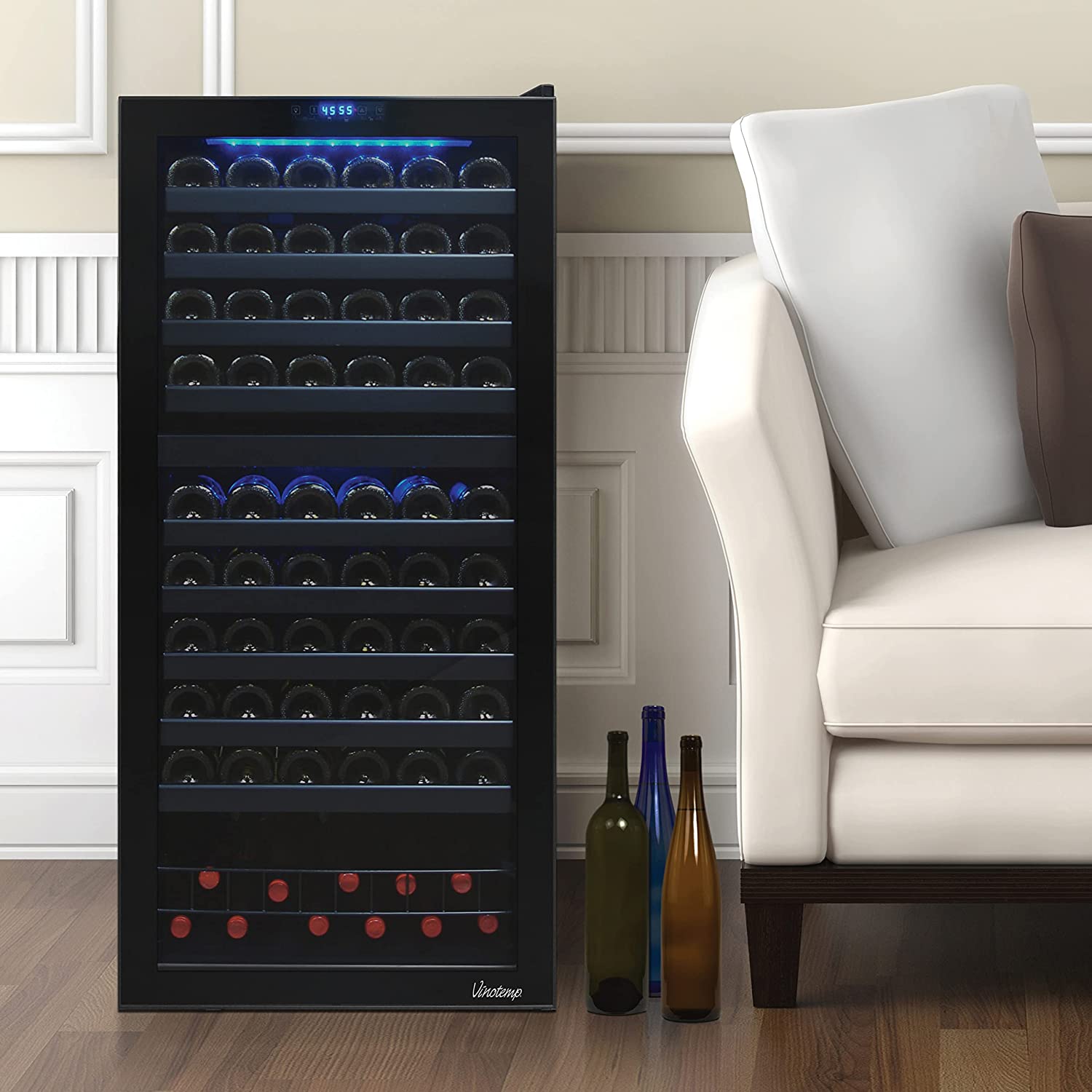 A wine fridge with bottles of different wines stored at the ideal temperature